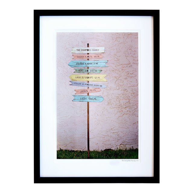 Personalized family sign post printed in a black frame