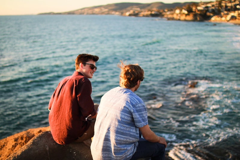 friends talking about their issues together at the beach