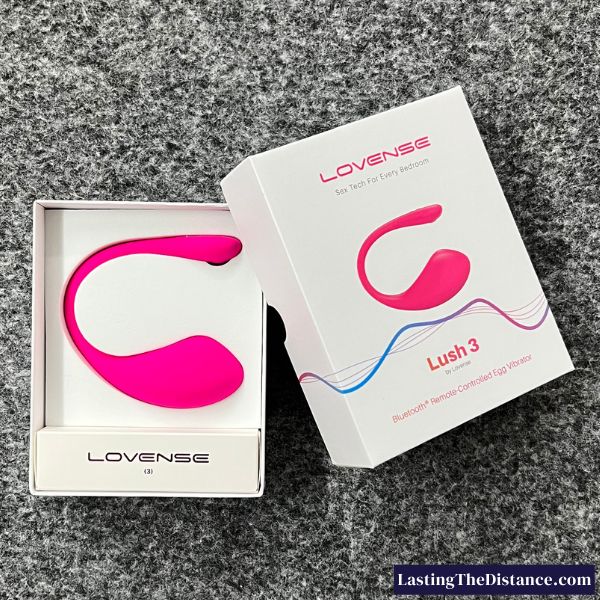 lovense lush 3 open box revealing the device with the top of the box just off to the side